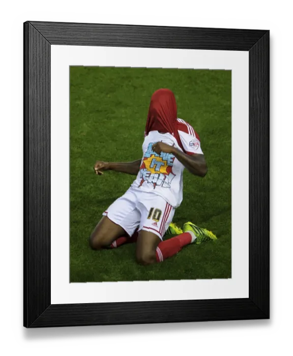 Framed Print : Bristol City's Jay Emmanuel-Thomas Scores and Celebrates with a Framed Print : Bristol City's Jay Emmanuel-Thomas Scores and Celebrates with a