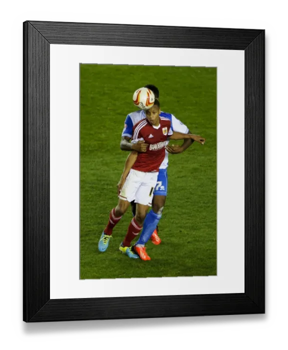 Framed Print : Bristol Derby: Intense Clash between Bobby Reid (Bristol City) and Ellis Harrison (Bristol Rovers) in the Johnstones Paint Trophy First Round Framed Print : Bristol Derby: Intense Clash between Bobby Reid (Bristol City) and Ellis Harrison (Bristol Rovers) in the Johnstones Paint Trophy First Round