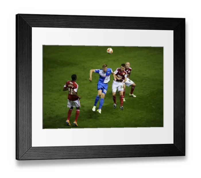 Framed Print : Bristol Derby: Intense Aerial Battle Between Ryan Brunt and Nicky Shorey Framed Print : Bristol Derby: Intense Aerial Battle Between Ryan Brunt and Nicky Shorey