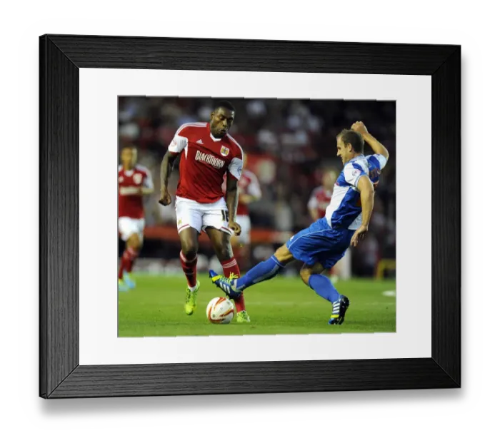 Framed Print : Bristol Derby: Intense Moment as McChrystal Tackles Emmanuel-Thomas in Johnstone Paint Trophy Match Framed Print : Bristol Derby: Intense Moment as McChrystal Tackles Emmanuel-Thomas in Johnstone Paint Trophy Match
