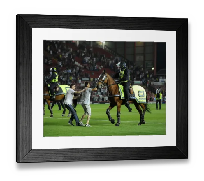 Framed Print : Bristol Derby Chaos: Fan Attacks Police Horse During Bristol City vs. Bristol Rovers Match Framed Print : Bristol Derby Chaos: Fan Attacks Police Horse During Bristol City vs. Bristol Rovers Match