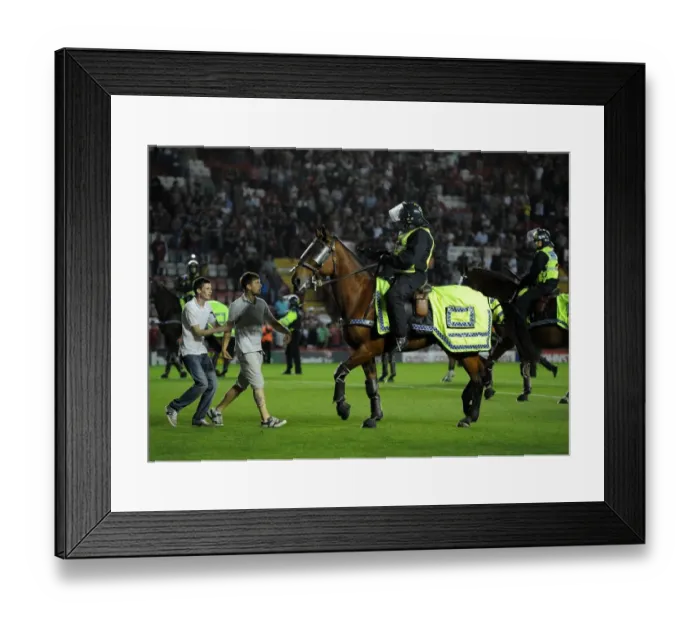 Framed Print : Bristol Derby Chaos: Fan Assaults Police Horse at Ashton Gate