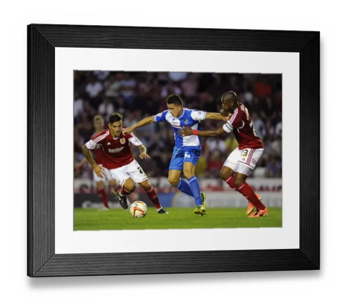 Framed Print : Bristol Derby: Intense Battle Between Marlon Harewood (Bristol City) and Oliver Norburn (Bristol Rovers) in the Johnstone Paint Trophy First Round at Ashton Gate, 2013
