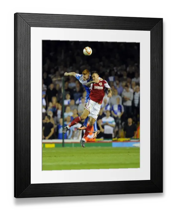 Framed Print : Intense Rivalry: A Clash Between Pack and Harrold in the Bristol Derby Framed Print : Intense Rivalry: A Clash Between Pack and Harrold in the Bristol Derby