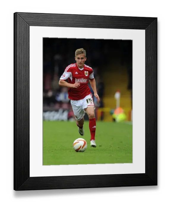 Framed Print : Bristol City's Joe Bryan in Action Against Peterborough United at Ashton Gate Framed Print : Bristol City's Joe Bryan in Action Against Peterborough United at Ashton Gate