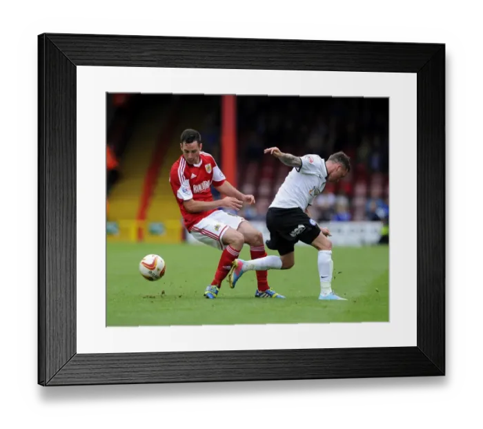 Framed Print : Battling for Supremacy: Bristol City vs. Peterborough United, 14 / 09 / 2013