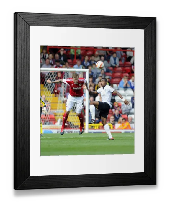 Framed Print : Intense Aerial Battle: Flint vs Assombalonga - Football Rivalry in the Sky