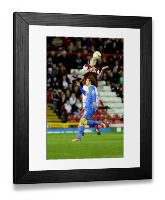 Framed Print : Aden Flint Wins a Header for Bristol City against Shrewsbury Town, Sky Bet League One, September 17, 2013