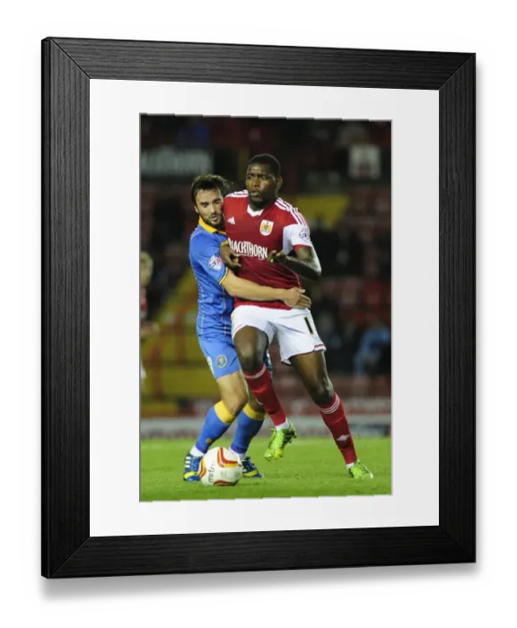 Framed Print : Bristol City's Jay Emmanuel-Thomas Foul by Aaron Wildig during Bristol City vs Shrewsbury Town Framed Print : Bristol City's Jay Emmanuel-Thomas Foul by Aaron Wildig during Bristol City vs Shrewsbury Town