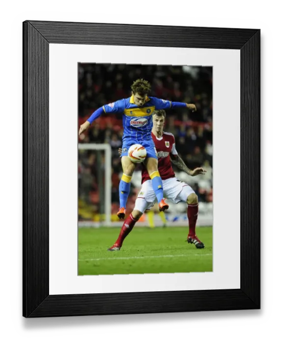Framed Print : Intense Rivalry: Aden Flint vs Tom Bradshaw - Football Showdown at Ashton Gate Framed Print : Intense Rivalry: Aden Flint vs Tom Bradshaw - Football Showdown at Ashton Gate