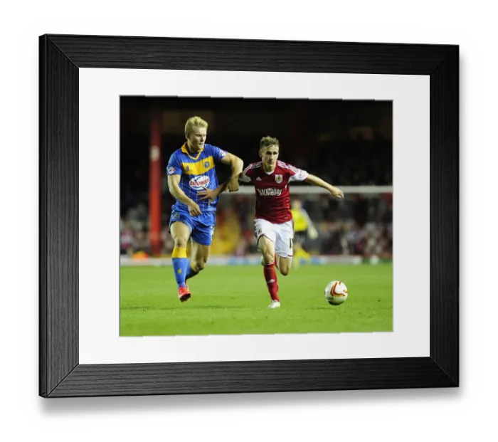 Framed Print : Intense Rivalry: Joe Bryan vs Curtis Main Clash in Sky Bet League One: Bristol City vs Shrewsbury Town