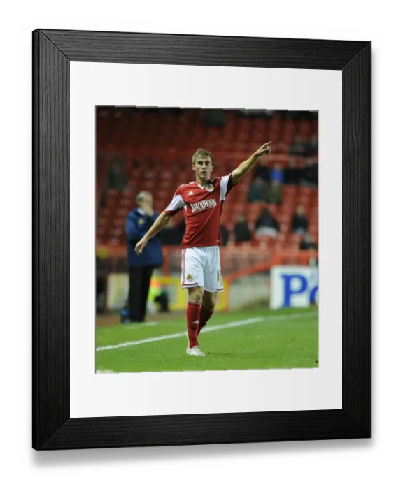 Framed Print : Bristol City's Joe Bryan in Action at Ashton Gate, September 2013