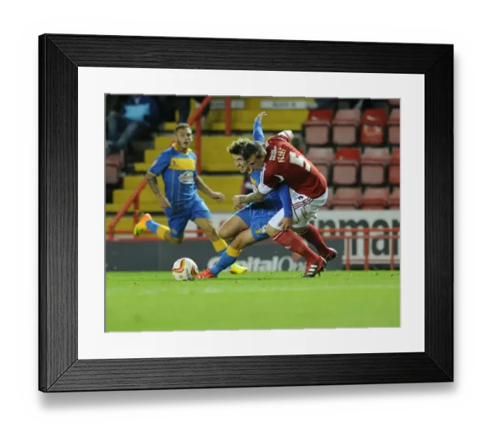 Framed Print : Aden Flint Fouls Tom Bradshaw in Bristol City vs Shrewsbury Town Football Match, September 13, 2013