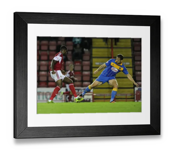 Framed Print : Intense League One Clash: Jay Emmanuel-Thomas Tackled at Ashton Gate Framed Print : Intense League One Clash: Jay Emmanuel-Thomas Tackled at Ashton Gate