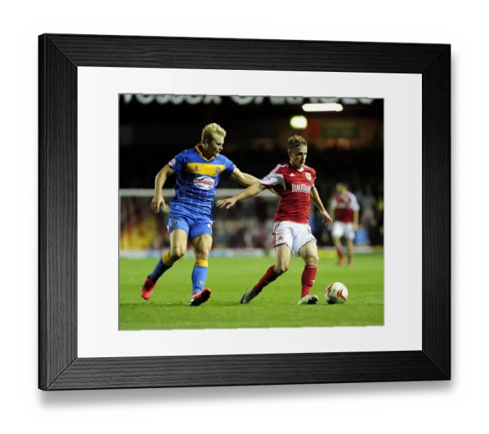 Framed Print : Bristol City's Joe Bryan Fends Off Shrewsbury Town Opponent in League One Clash Framed Print : Bristol City's Joe Bryan Fends Off Shrewsbury Town Opponent in League One Clash