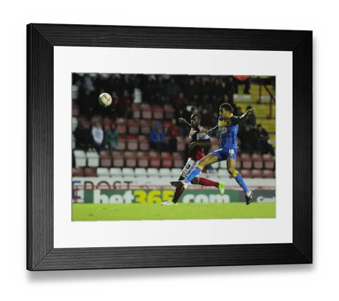 Framed Print : Intense Rivalry: Harewood vs Goldson Clash at Ashton Gate Framed Print : Intense Rivalry: Harewood vs Goldson Clash at Ashton Gate