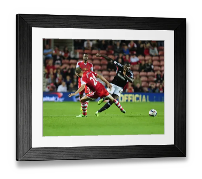 Framed Print : Bristol City's Jay Emmanuel-Thomas Evades Jos Hooiveld in Southampton Showdown Framed Print : Bristol City's Jay Emmanuel-Thomas Evades Jos Hooiveld in Southampton Showdown