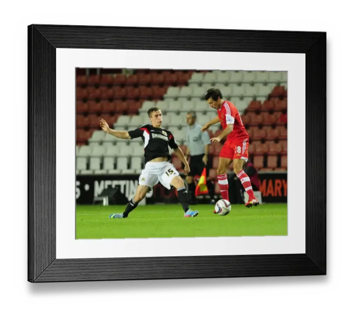 Framed Print : Bristol City vs Southampton: Joe Bryan Faces Off Against Jack Cork Framed Print : Bristol City vs Southampton: Joe Bryan Faces Off Against Jack Cork