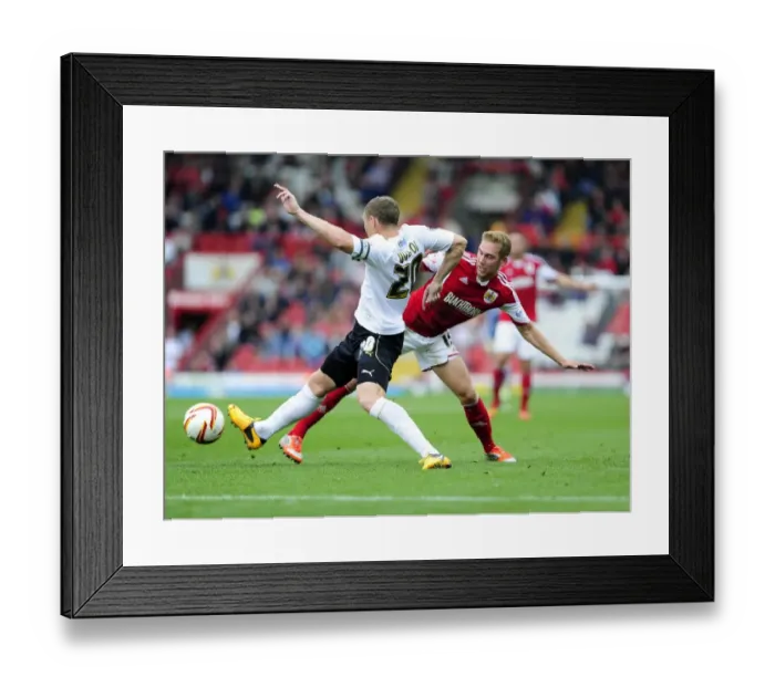 Framed Print : Wagstaff vs Wilson: Intense Clash Between Bristol City's Scott Wagstaff and Colchester United's Brian Wilson at Ashton Gate, Sky Bet League One