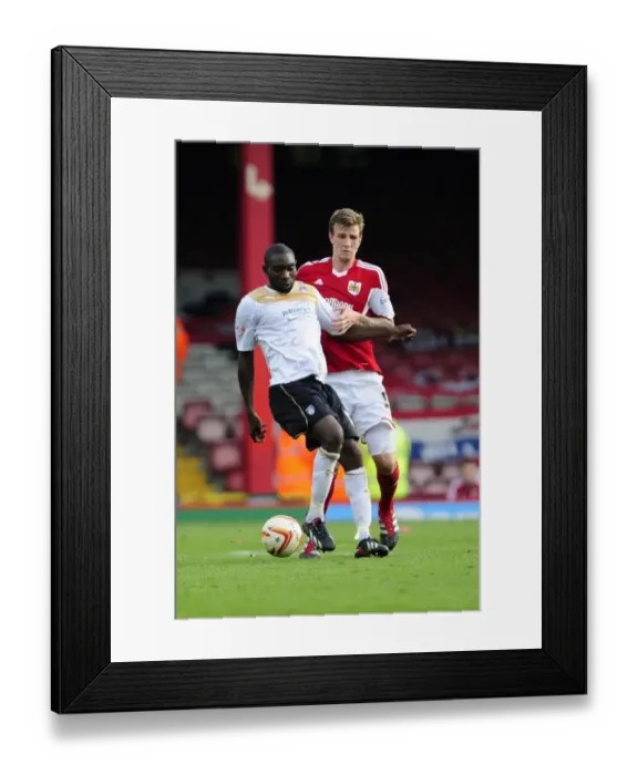 Framed Print : Clash of the Titans: Aden Flint vs Jabo Ibehre, Bristol City vs Colchester United, League One Football Rivalry, September 2013 Framed Print : Clash of the Titans: Aden Flint vs Jabo Ibehre, Bristol City vs Colchester United, League One Football Rivalry, September 2013