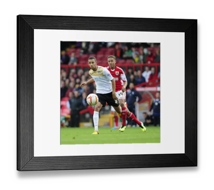 Framed Print : Bristol City vs Colchester United: Reid vs Eastmond - A Football Rivalry Unfolds
