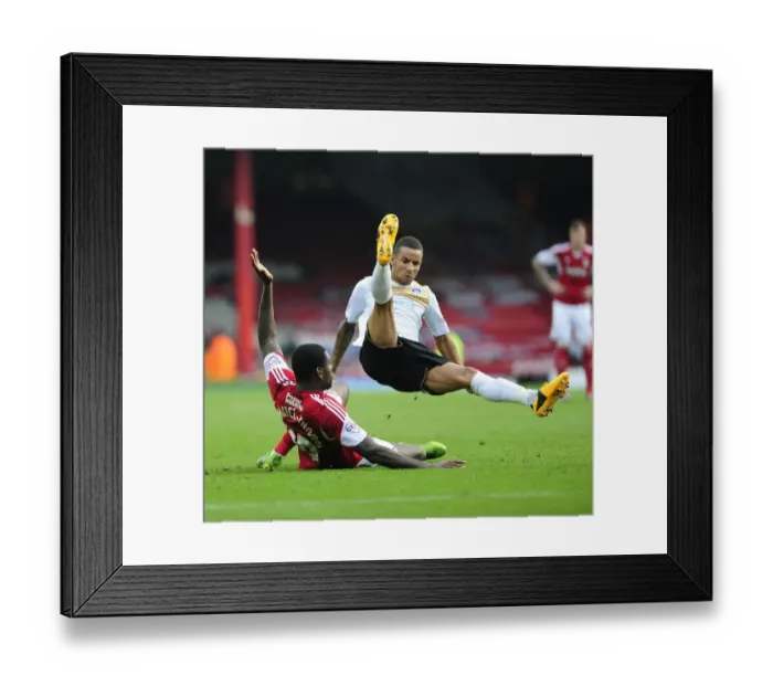 Framed Print : Jay Emmanuel-Thomas Tackles Craig Eastmond in Intense Football Action - Bristol City vs Colchester United