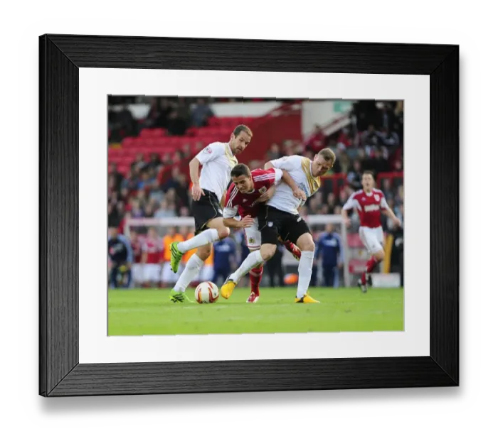 Framed Print : Bristol City vs Colchester United: McLaughlin Fouled by Wilson