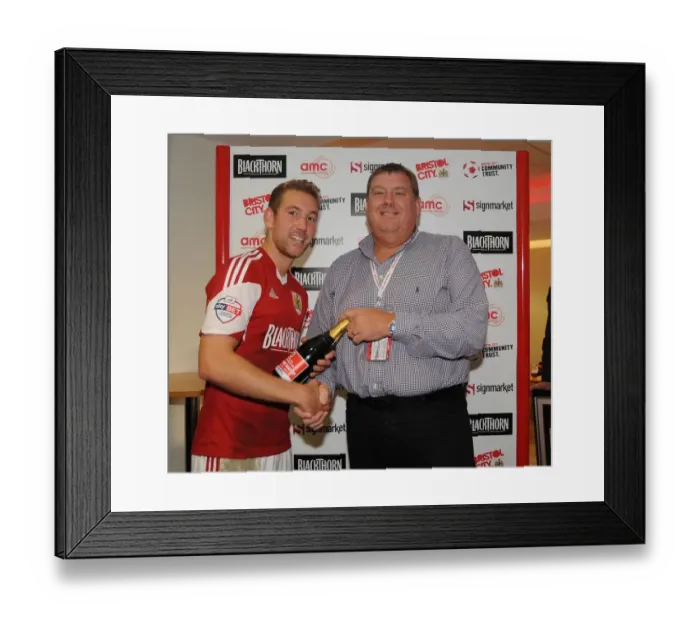 Framed Print : Bristol City Star Receives Man of the Match Award after Triumph over Colchester United at Ashton Gate, September 28, 2013