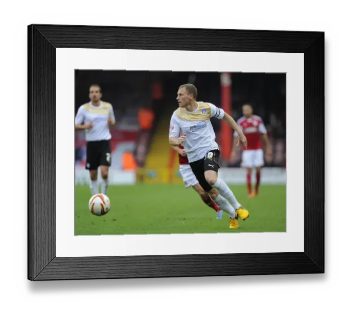 Framed Print : Focused: Brain Wilson of Colchester United in Action at Ashton Gate Framed Print : Focused: Brain Wilson of Colchester United in Action at Ashton Gate