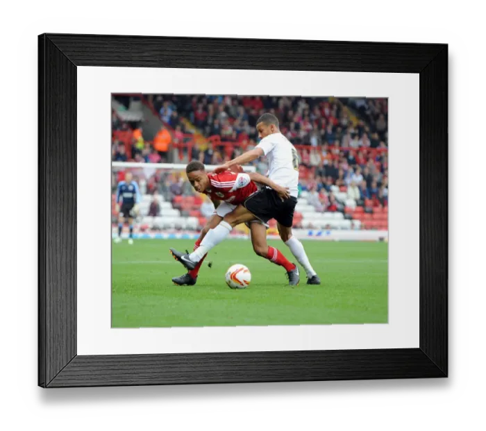 Framed Print : Bobby Reid vs Craig Eastmond: A Football Rivalry Unfolds in Sky Bet League One - Bristol City vs Colchester United Framed Print : Bobby Reid vs Craig Eastmond: A Football Rivalry Unfolds in Sky Bet League One - Bristol City vs Colchester United