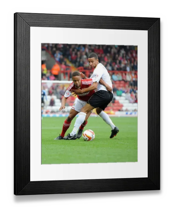 Framed Print : Bobby Reid vs Craig Eastmond: A Football Rivalry Unfolds in Sky Bet League One - Bristol City vs Colchester United Framed Print : Bobby Reid vs Craig Eastmond: A Football Rivalry Unfolds in Sky Bet League One - Bristol City vs Colchester United