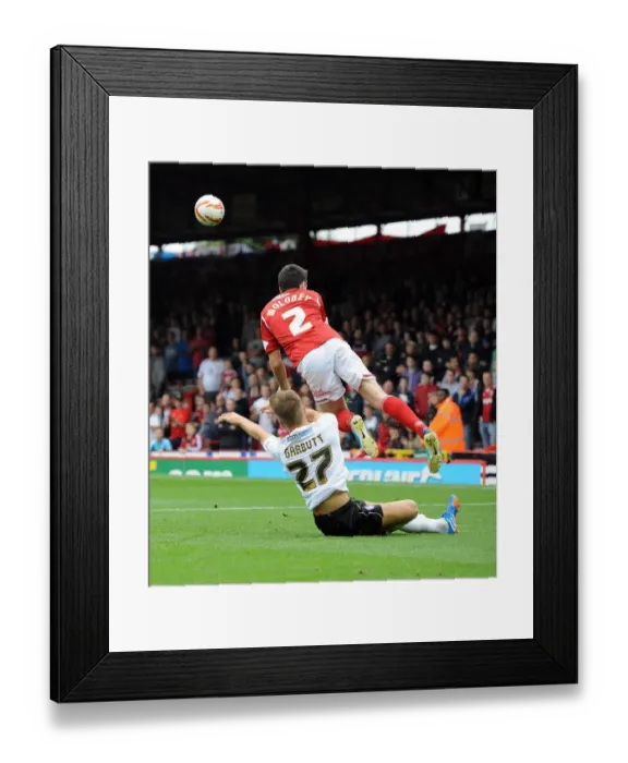 Framed Print : Bristol City's Moloney Fouls by Garbutt in Sky Bet League One Clash Framed Print : Bristol City's Moloney Fouls by Garbutt in Sky Bet League One Clash