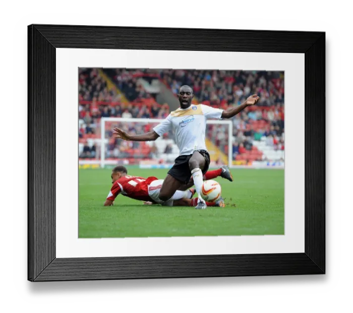 Framed Print : Intense Rivalry: Bobby Reid vs Jabo Ibehre at Ashton Gate Framed Print : Intense Rivalry: Bobby Reid vs Jabo Ibehre at Ashton Gate