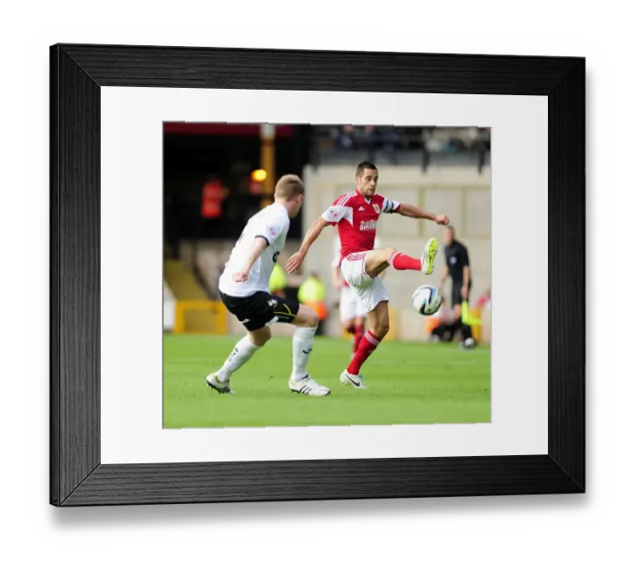 Framed Print : Bristol City's Sam Baldock Reaches for the Ball in Port Vale Showdown Framed Print : Bristol City's Sam Baldock Reaches for the Ball in Port Vale Showdown