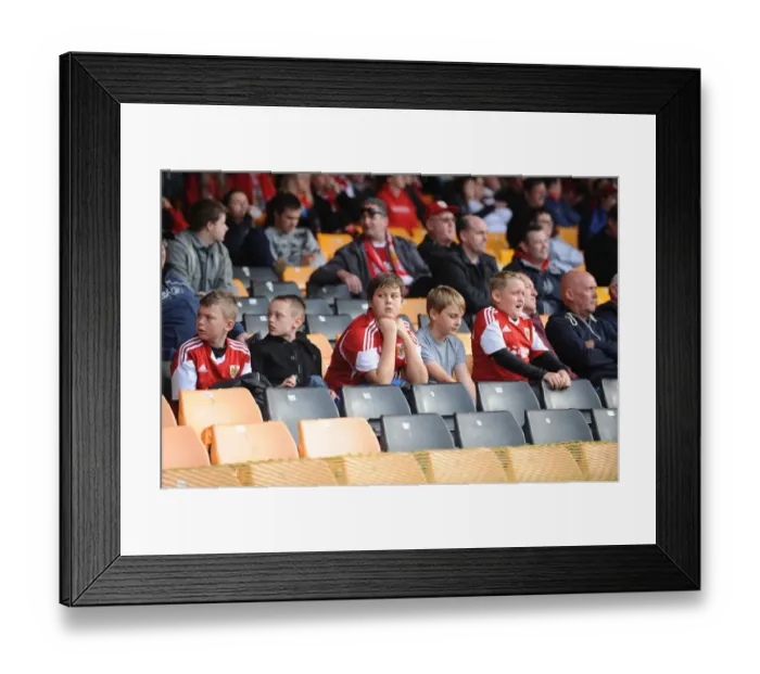 Framed Print : Bored Young Fans at Port Vale vs. Bristol City Football Match, 2013