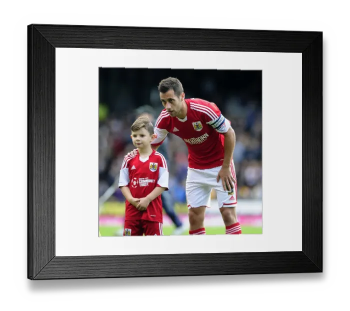 Framed Print : Bristol City's Sam Baldock and Mascot Celebrate at Vale Park during Port Vale vs. Bristol City, Sky Bet League 1 Match Framed Print : Bristol City's Sam Baldock and Mascot Celebrate at Vale Park during Port Vale vs. Bristol City, Sky Bet League 1 Match
