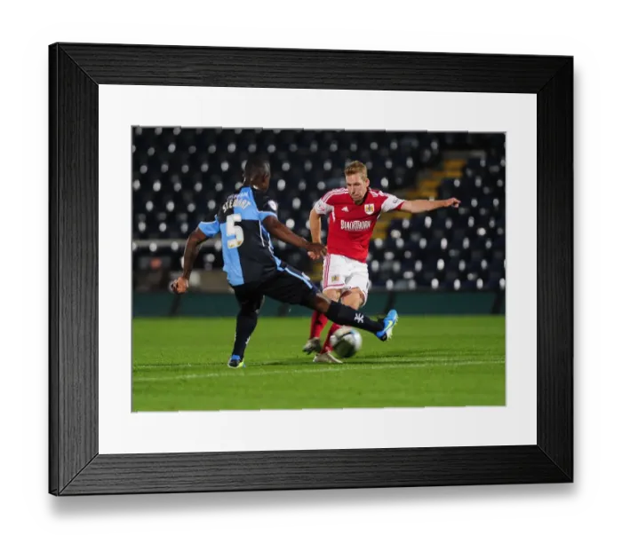 Framed Print : Intense Football Rivalry: Bristol City vs Wycombe Wanderers in the Johnstone's Paint Trophy (October 8, 2013)