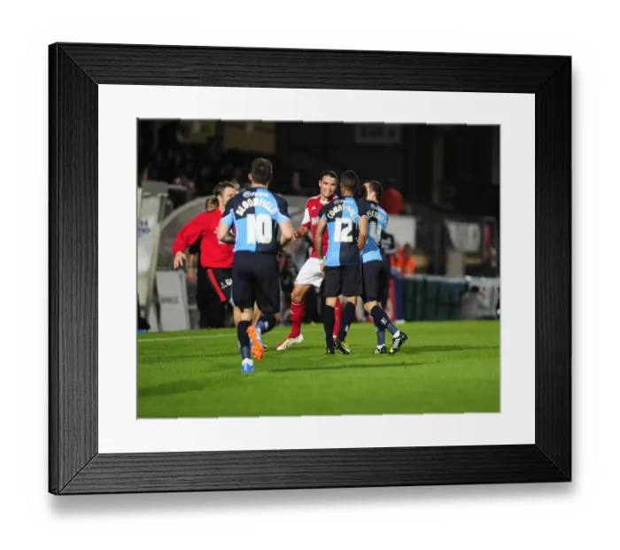 Framed Print : Intense Football Rivalry: Bristol City vs Wycombe Wanderers in the Johnstone's Paint Trophy Clash at Adams Park (2013)