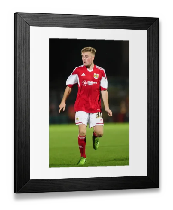 Framed Print : Intense Football Rivalry: Bristol City vs Wycombe Wanderers in the Johnstone's Paint Trophy Clash at Adams Park (2013)
