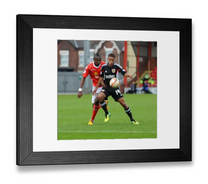 Framed Print : Bobby Reid Under Pressure: A Moment from Crewe vs. Bristol City Football Match, October 2013
