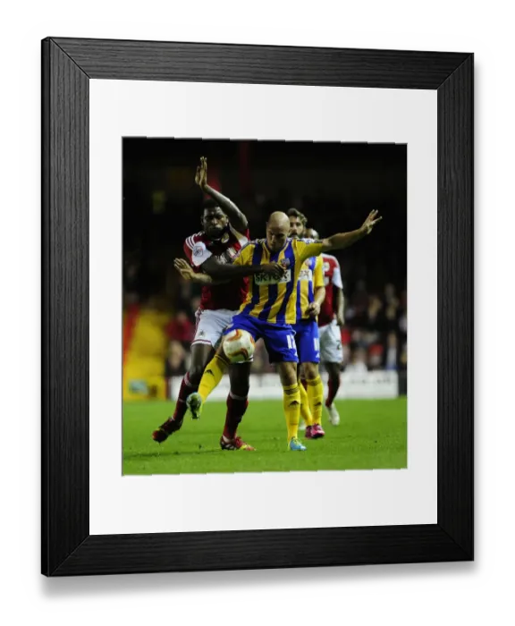 Framed Print : Bristol City vs Brentford: Intense Battle for Possession - Jay Emmanuel-Thomas vs Alan McCormack