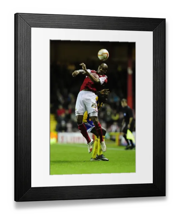Framed Print : Marvin Elliott vs. Clayton Donaldson: Heading Battle at Ashton Gate - Bristol City vs. Brentford, Sky Bet League One Framed Print : Marvin Elliott vs. Clayton Donaldson: Heading Battle at Ashton Gate - Bristol City vs. Brentford, Sky Bet League One