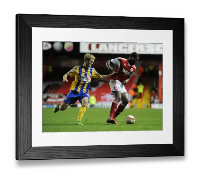 Framed Print : Bristol City vs Brentford: Jay Emmanuel-Thomas Evades George Saville