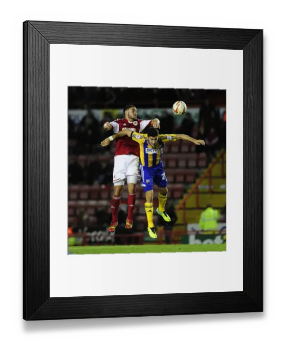 Framed Print : Bristol City vs Brentford: Derrick Williams Tackles Raphael Calvet