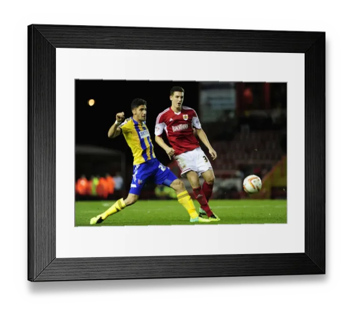 Framed Print : Bristol City vs Brentford: Lewis Dunk Faces Off Against Raphael Calvet Framed Print : Bristol City vs Brentford: Lewis Dunk Faces Off Against Raphael Calvet