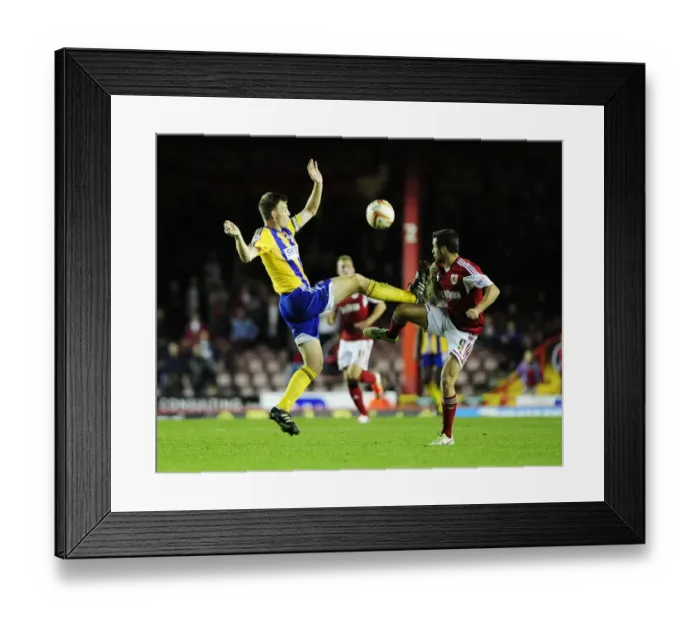 Framed Print : Intense Rivalry: Sam Baldock vs Tony Craig - A Battle for Possession
