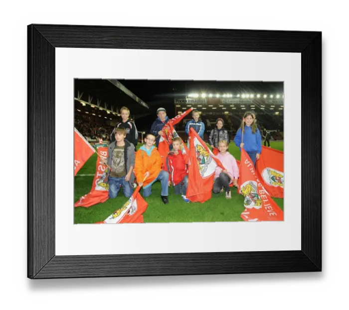 Framed Print : Flag Bearers Leading Out Teams at Bristol City vs Brentford, Sky Bet League One (10-22-2013)