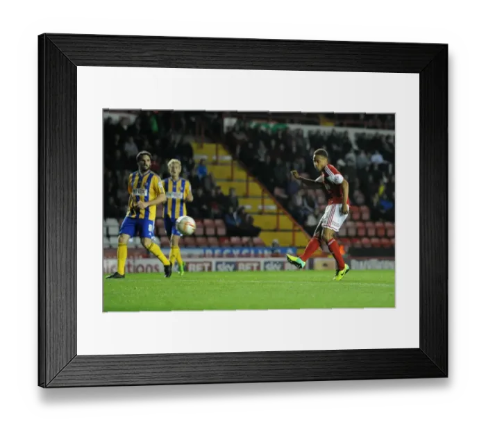 Framed Print : Bobby Reid Goes for Glory: A Pivotal Moment in the Bristol City vs. Brentford Football Match, October 2013