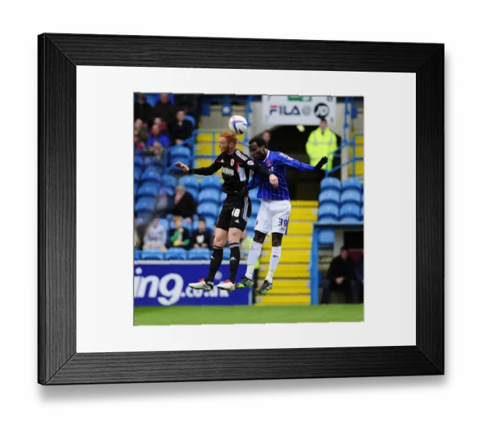 Framed Print : Ryan Taylor vs Pascal Chimbonda: Clash at the Brunton Park Header Framed Print : Ryan Taylor vs Pascal Chimbonda: Clash at the Brunton Park Header