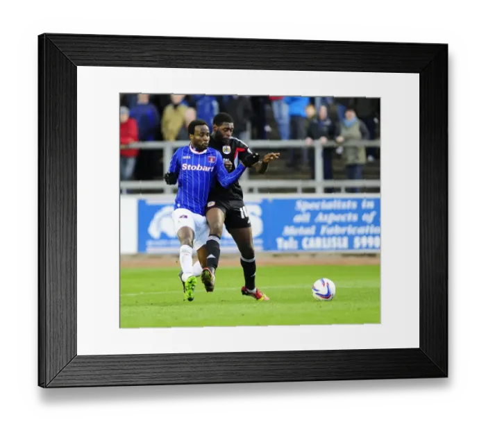 Framed Print : Jay Emmanuel-Thomas vs. David Symington: Intense Moment in Carlisle United vs. Bristol City Football Match, October 2013 Framed Print : Jay Emmanuel-Thomas vs. David Symington: Intense Moment in Carlisle United vs. Bristol City Football Match, October 2013